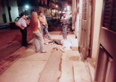 Dead Body with Towel Covering Face on Bourbon Street New Orleans LA