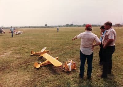 Men Discussing the Art of Flying Model Airplanes