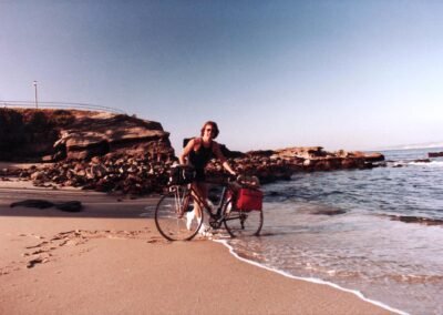 Glen Woodfin Celebrates the Finish of Coast to Coast Bicycle Trip at La Jolla Cove San Diego CA January 1 1984